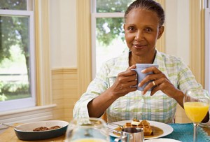 getty_rf_photo_of_woman_eating_breakfast