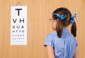 getty_rf_photo_of_young_girl_reading_eye_chart