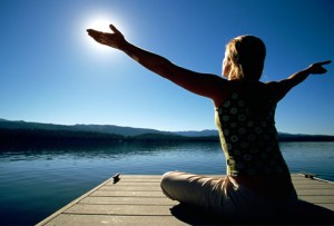 getty_rm_photo_of_woman_sitting_on_dock